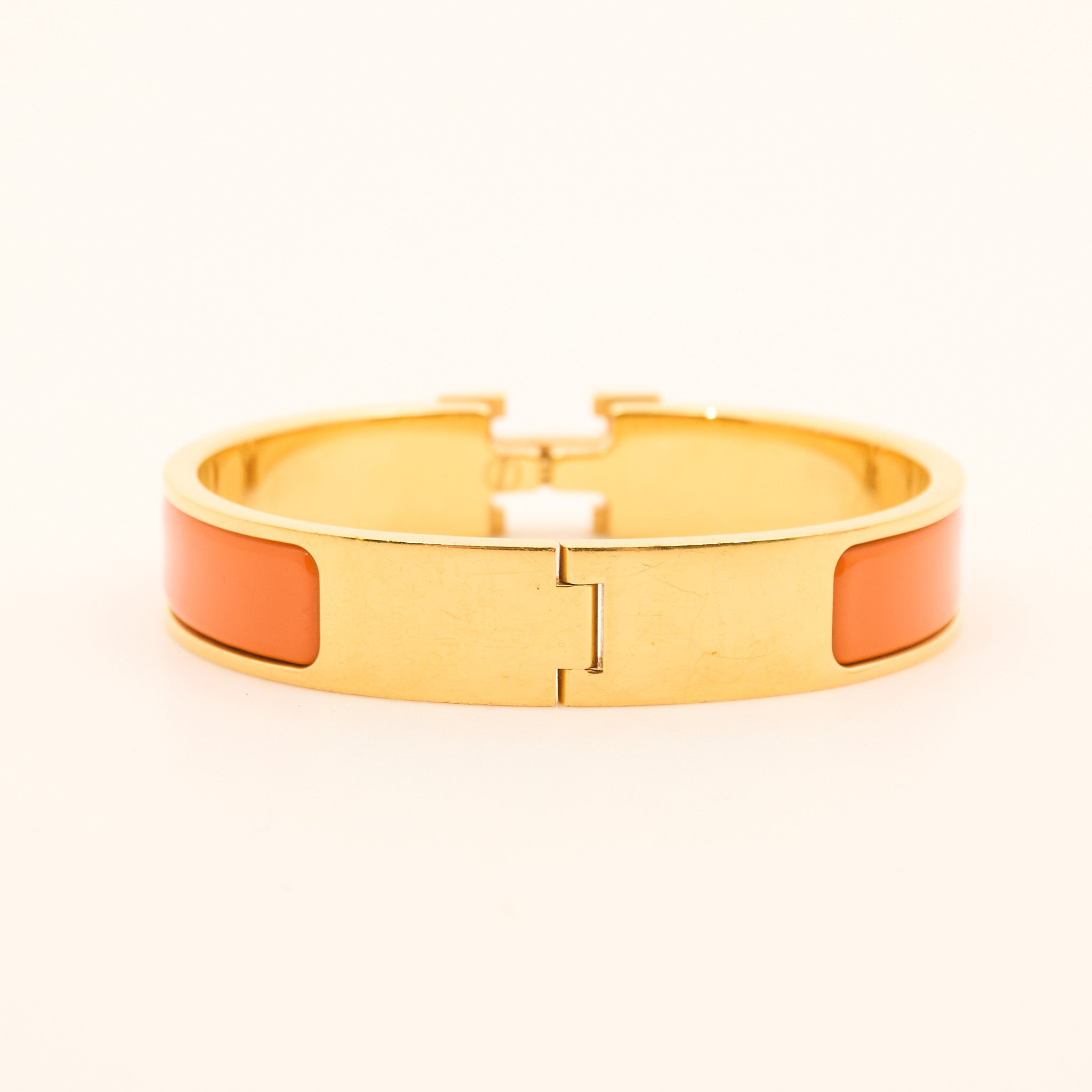 Hermès Clic H Bracelet in Orange and Gold PM