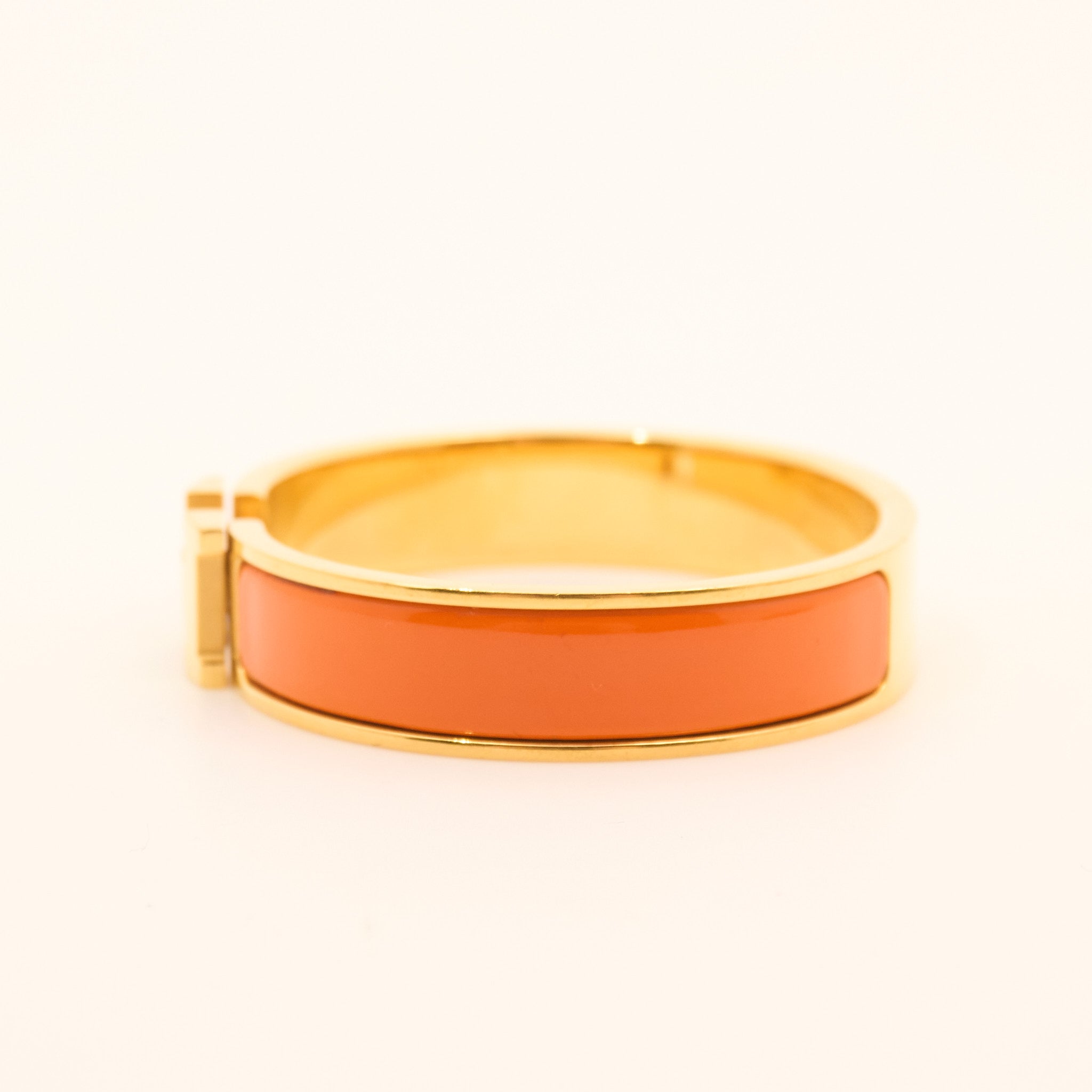 Hermès Clic H Bracelet in Orange and Gold PM