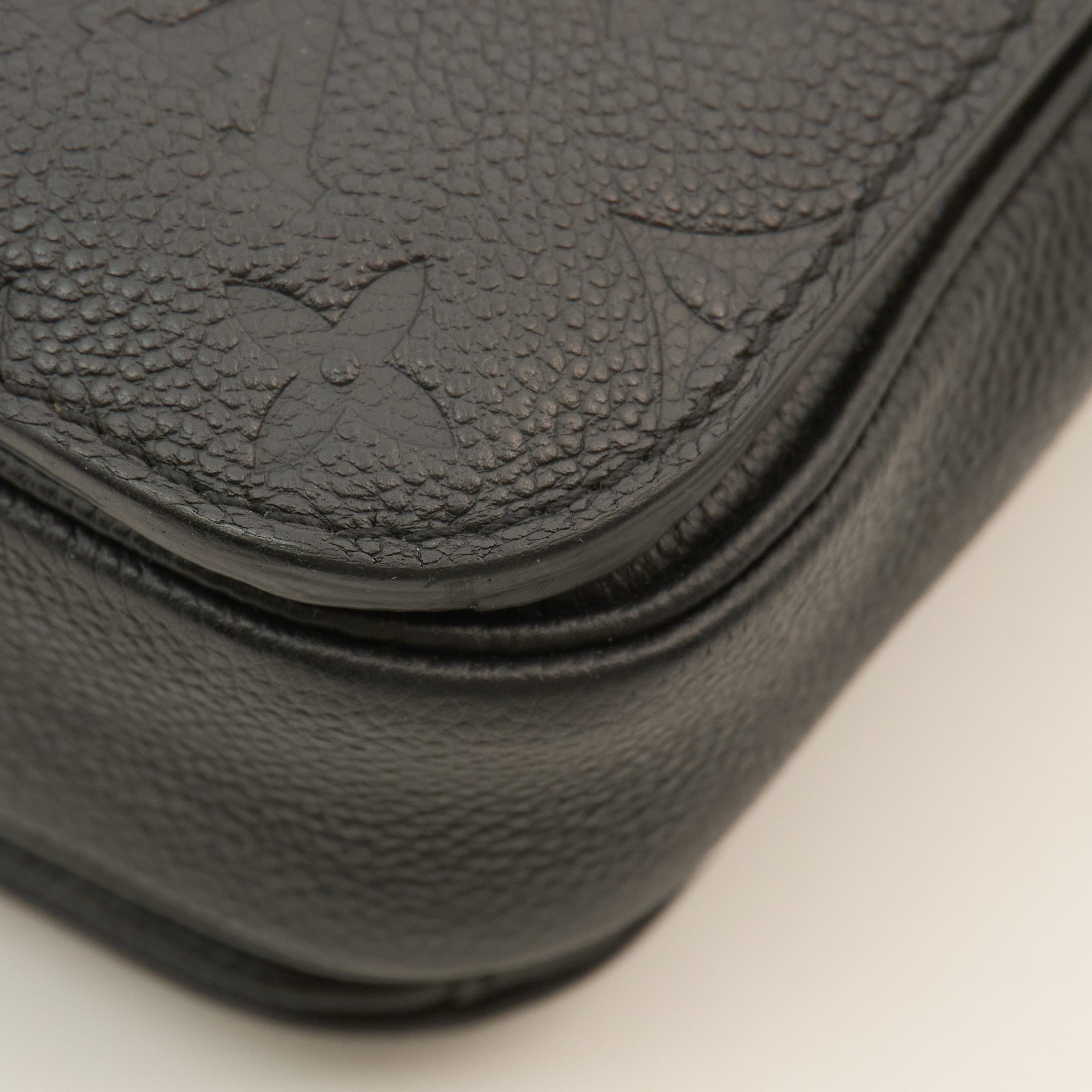 Louis Vuitton Monogram Empreinte Pochette Métis in Black