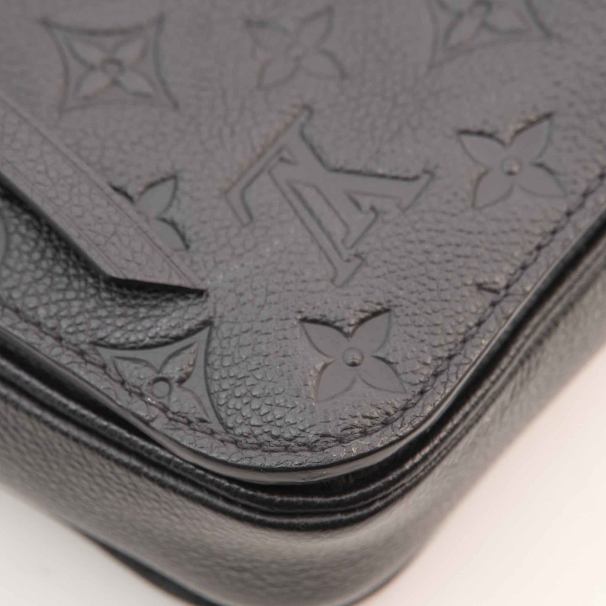 Louis Vuitton Monogram Empreinte Pochette Métis in Black