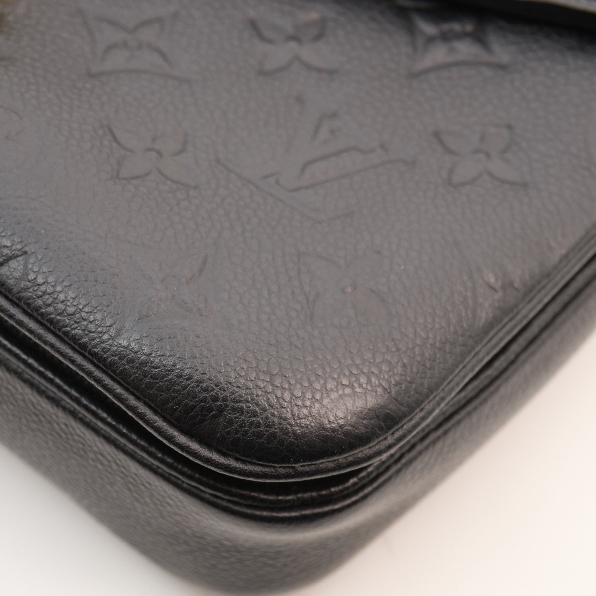 Louis Vuitton Monogram Empreinte Pochette Métis in Black