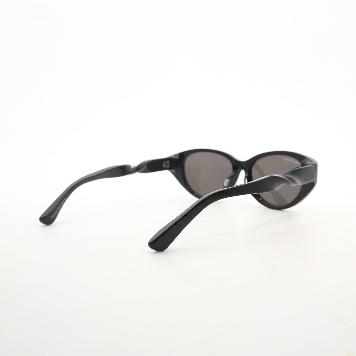 Balenciaga Black Oval Twist Sunglasses