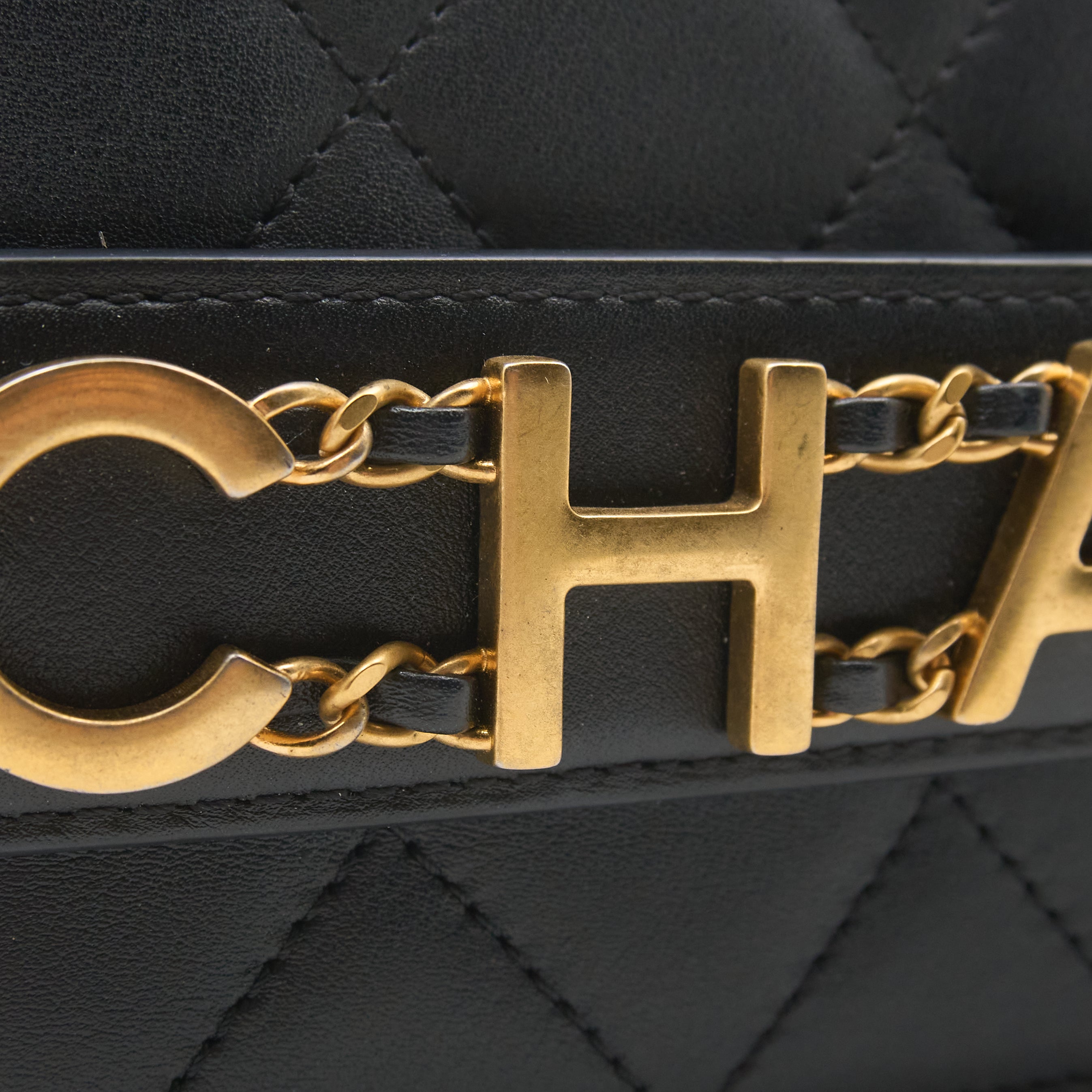 Chanel Logo Enchained Quilted Calfskin Flap Bag