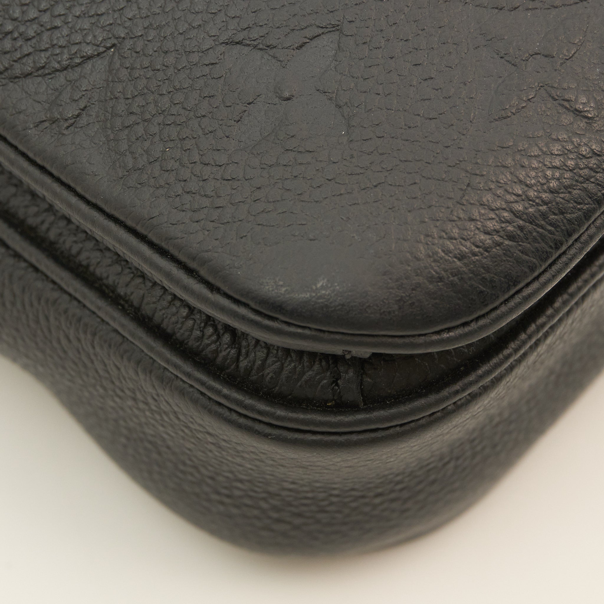 Louis Vuitton Monogram Empreinte Pochette Métis in Black