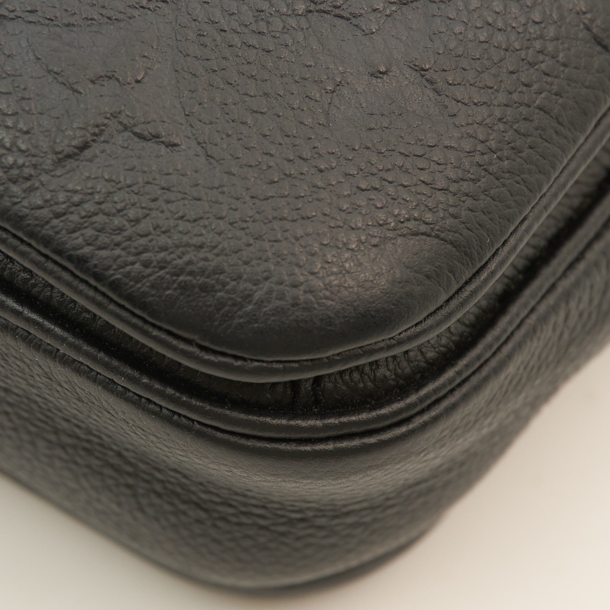 Louis Vuitton Monogram Empreinte Pochette Métis in Black